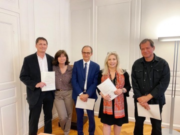Lors de la signature de la réforme du système d’évaluation et de rémunération